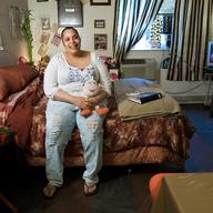 Lissette Encarnacion in her apartment at The Brook, a supportive housing complex in the Bronx