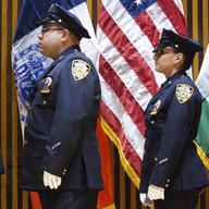 NYPD officers wait in line during a ceremony at One Police Plaza.