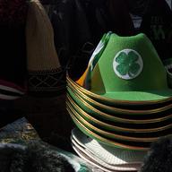 A stack of shamrock hats sit on a vendor's table on seventh avenue in midtown Manhattan the Friday before St. Patrick's Day.
