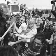 In 2009 in China, hundreds of Uyghur political demonstrations disappeared without a trace. Uyghur women, calling for the return of their son and husbands, is broken up by Chinese armed forces.
