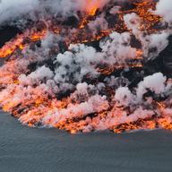 An aerial picture taken on September 14, 2014 shows lava flowing out of the Bardarbunga volcano in southeast Iceland.
