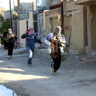 The members of Islamic State of Iraq and the Levant (ISIL) lay siege to the Tuzhurmatu district in Kirkuk, Iraq on February 13, 2014.