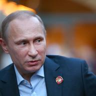 Russian President Vladimir Putin visits USA House in the Olympic Village on February 14, 2014 in Sochi, Russia.