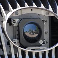 A camera peers out from the front grill of Google's self-driving car in Mountain View, California, on May 13, 2014. 