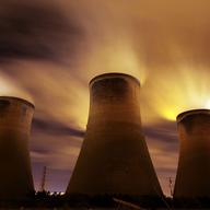 The coal fueled Fiddlers Ferry power station emits vapour into the night sky on November 16, 2009 in Warrington, United Kingdom.