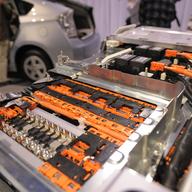 A sample showing the insides of a new lithium-ion battery is on display during Toyota Motors' new Prius Plug-in Hybrid vehicle press preview at the company's showcase, Mega Webb in Tokyo.