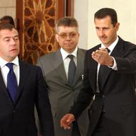 Syrian President Bashar Assad (R) receives Russian President Dmitry Medvedev (L) May 10, 2010 in Damascus, Syria. Assad uses connections with shell companies to secure his fortune.
