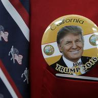 Donald Trump supporter Robert Tally wears a button of Trump before the California Republican Party 2016 Convention in Burlingame, Calif., Friday, April 29, 2016. 