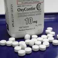 This Feb. 19, 2013, file photo, shows OxyContin pills arranged for a photo at a pharmacy in Montpelier, Vt., a location enduring the opioid drug epidemic. 