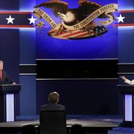Democratic presidential nominee Hillary Clinton exchanges views with Republican presidential nominee Donald Trump during the third presidential debate at UNLV in Las Vegas, Wednesday, Oct. 19, 2016.