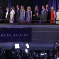 President-elect Donald Trump, left, followed by his family are photographed by members of the media as they arrive at his election night rally, Wednesday, Nov. 9, 2016, in New York. 