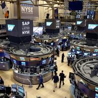 Traders work the floor at the New York Stock Exchange, Thursday, Feb. 9, 2017. 