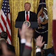 President Donald Trump looks at reporters during a news conference, Thursday, Feb. 16, 2017, in the East Room of the White House in Washington.