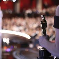 One of the best picture Oscar statuettes appears off stage as Warren Beatty and Faye Dunaway announce the best picture winner at the Oscars on Sunday, Feb. 26, 2017, at the Dolby Theatre in L.A.