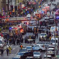 Law enforcement officials work following an explosion near New York's Times Square on Monday, Dec. 11, 2017.