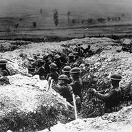 U.S. troops stand in trenches during World War I in France in 1918.