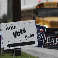 In this March 2, 2018, file photo, signs mark a polling site as early voting begins, in San Antonio. Democrats in Texas are early voting in bigger numbers ahead of the nation's first primary elections