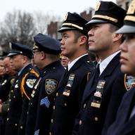Asian-American police officers from across the country attend the funeral of Wenjian Liu in Brooklyn on Jan. 4, 2014.