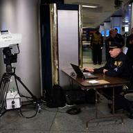 This explosive detection device scans one person at a time using a joy stick. Officials admitted it would be difficult to scan a large crowd of people entering the station at once.