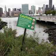 Warning signs at at Combined Sewer Overflow location in Long Island City, Queens.
