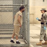 Payman Maadi (Ali Amir) and Kristen Stewart (Pvt. Amy Cole) in Peter Sattler’s CAMP X RAY