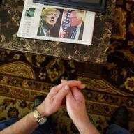 Coal miner Scott Tiller he sits in his living room after working a shift in an underground mine less than 40-inches high in Lashmeet, W.Va.