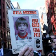 NYPD spokesman Paul Browne holding the original missing persons sign for Etan Patz, who went missing in 1979. FBI and NYPD excavated a building on Prince Street.
