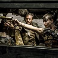 TOM HARDY as Max Rockatansky and CHARLIZE THERON as Imperator Furiosa in Warner Bros. Pictures' and Village Roadshow Pictures' action adventure 'MAD MAX: FURY ROAD.' 