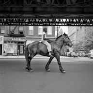 African-American Man on Horse NYC still from John Maloof and Charlie Siskel’s FINDING VIVIAN MAIER.