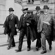 Detective Sergeant Joseph Petrosino, left, escorts Tomasso Petto, second from left, after his 1903 arrest in the Barrel Murder. Two of the city's top detectives--Arthur A. Carey and James McCafferty.