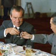 President Richard Nixon (USA) toasts Zhou Enlai the Chinese Prime Minister during a state banquet in Beijing in 1972. 