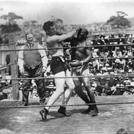Jack Johnson, right, of the USA, world heavyweight title holder since 1908, in action against Jess Willard of the USA at Havana, Cuba in 1915. 