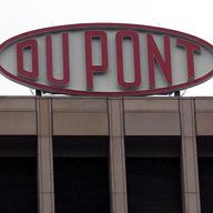 A DuPont sign is shown at the company's world headquarters April 12, 2004 in Wilmington, Delaware.