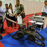 A Telemax Cobhom German robotic system for detecting, defusing and the disposal of explosive devices is demonstrated at the Asia Pacific Homeland Security conference and exhibition in Singapore.