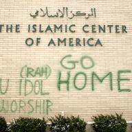 anti-Muslim graffiti on the wall of the Islamic Center of America in Dearborn, MI