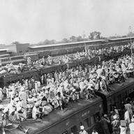 October 1947. Wagons packed with Muslin refugees fleeing to Pakistan while Indus fled to India by train in the border city of Amritsar between the two countries at the start of the India-Pakistan War