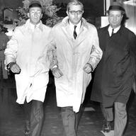 Former Water Commissioner James Marcus (center), is escorted from FBI headquarters in New York by two unidentified FBI agents. Marcus, who recently resigned as New York City Commissioner of Water Supp