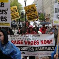 Activists demonstrate during a protest outside the National Restaurant Association's 28th Public Affairs Conference on April 29, 2014, in Washington, DC.