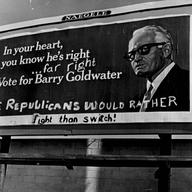 Partisans of both parties have been at work on the Barry Goldwater billboard at S. Dahlia St. and E. Evans Ave. 1964.