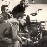 Jean Ritchie in the WNYC studios with Woody Guthrie, Peter Seeger, and Fred Hellerman. circa 1950