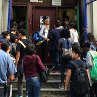 The students who sued the city said they were beaten and shoved by school safety agents, in one case after a dispute by a metal detector