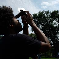 Watching the eclipse on August 21, 2017 in Central Park's Sheep Meadow.