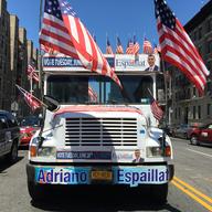 A bus that is driving around Upper Manhattan in support of State Senator  Adriano Espaillat's race for Charlie Rangle's congressional seat.