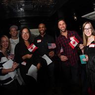 U.S. singles mingle with Canadians at launch of dating app.