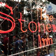 Dozens gathered at  Stonewall Inn to celebrate the Supreme Court's ruling legalizing gay marriage.