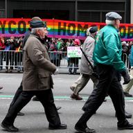 Irish groups march past anti-homophobia banners on Fifth Avenue at the St. Patrick's Day Parade on March 17, 2014.
