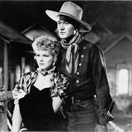 Claire Trevor and John Wayne in 'Stagecoach,' directed by John Ford, 1938