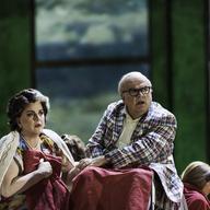 English baritone Alan Opie (as 'Leon Klinghoffer') and American mezzo-soprano Michaela Martens (as Marilyn Klinghoffer) perform during the final dress rehearsal for the Metropolitan Operas premiere.