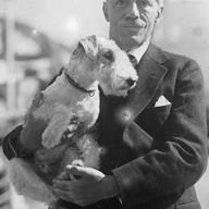 Violinist Fritz Kreisler in October 1930 with dog on board Europa travelling to New York.