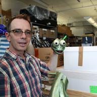 Matthew Brooks and his recently rebuilt puppet.